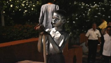 A Kid Begging in the name and fame of Mahatma Gandhi At Shilpkalavedika.PhotoBy M.A. Mujeeb