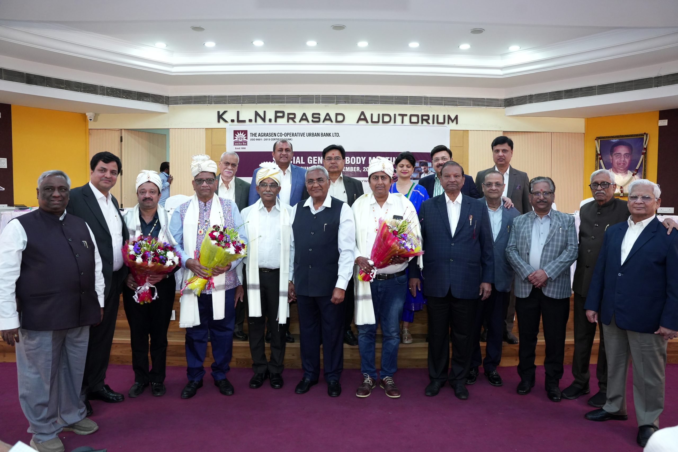 अग्रसेन और अग्रोहा बैंक विलय की घोषणा करते अधिकारी