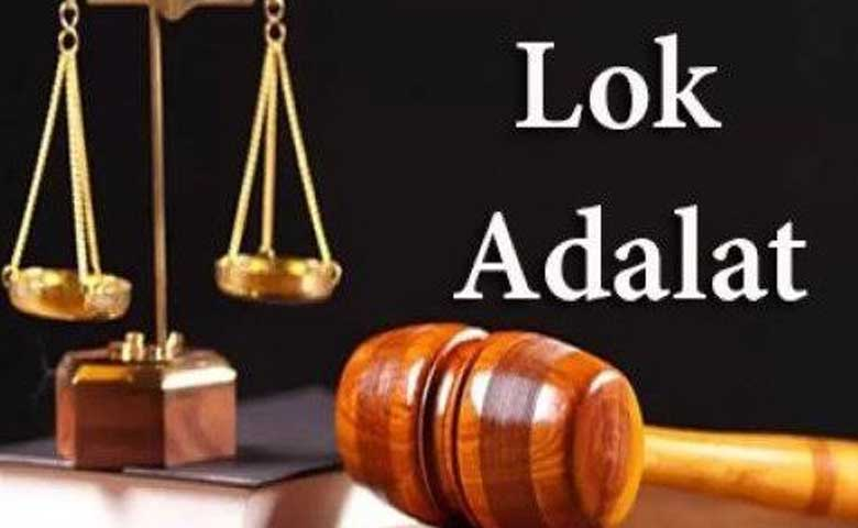राष्ट्रीय लोक अदालत में मामलों के निपटारे का दृश्य